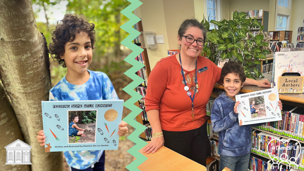 Dominic has brown curly hair and a great smile. On left, Dominic smiling and holding his book by a tree. On right, Dominic and Youth Services Librarian Ann smiling in front of the local author collection.